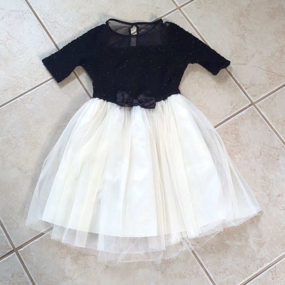 Girls size 8 tulle cream dress and black top with bow,  special occasion